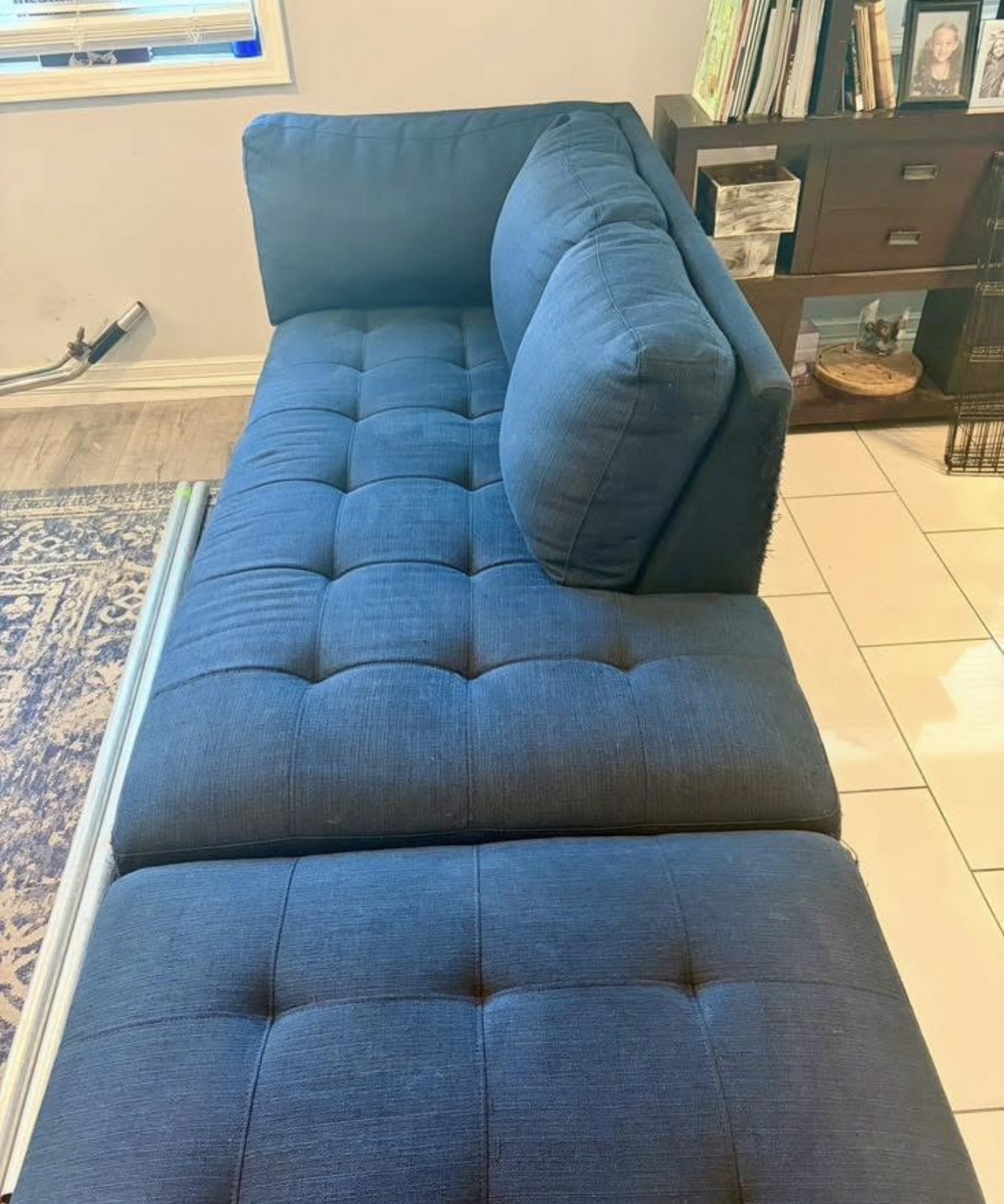 Blue tufted chaise sofa freshly cleaned